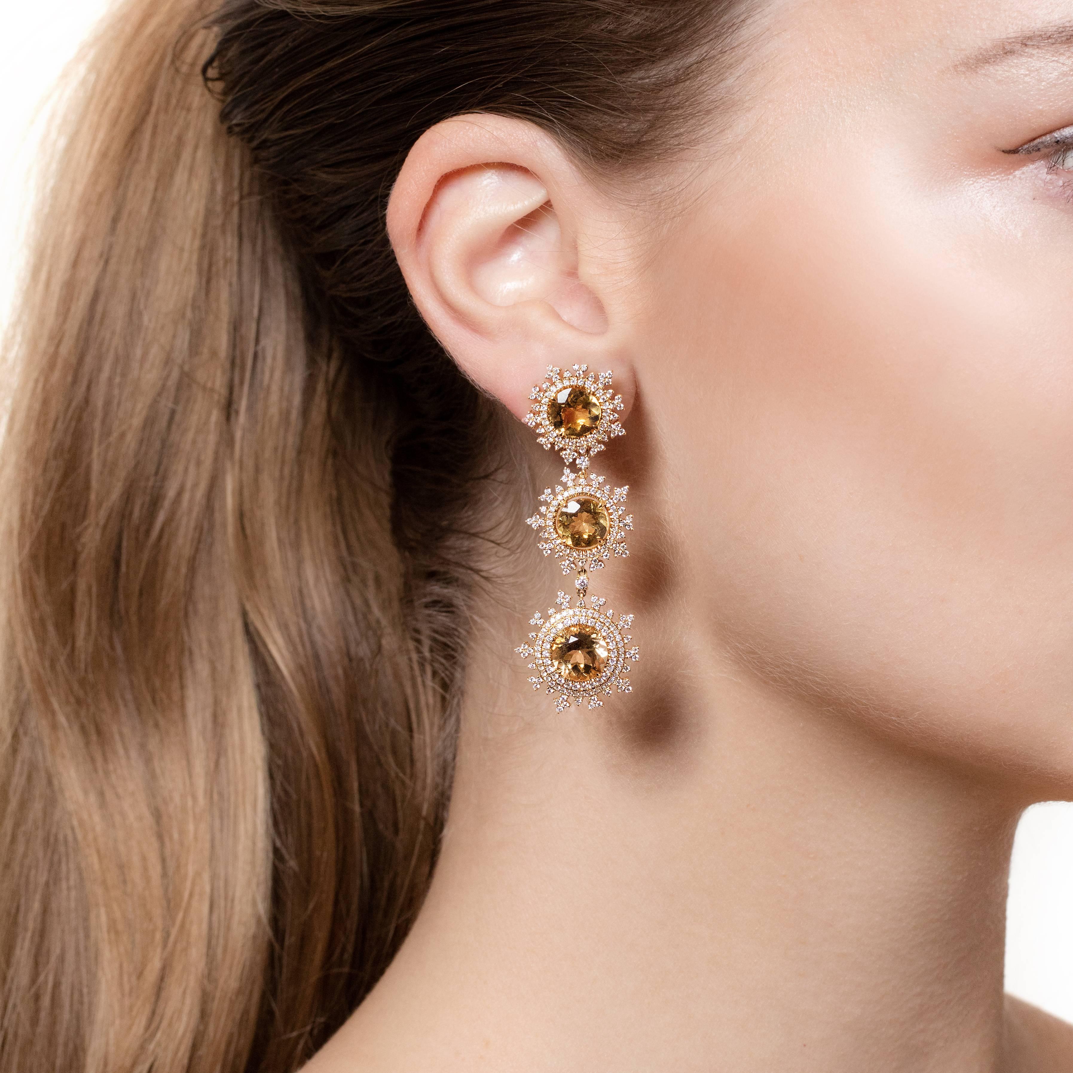 A stunning pair of long detachable flake earrings that are made from 18ct. yellow gold with 3 yellow beryl stones on each earring that are surrounded by 520 diamonds. They are part of Nadine Aysoy’s Tsarina Collection where nature is an incredible
