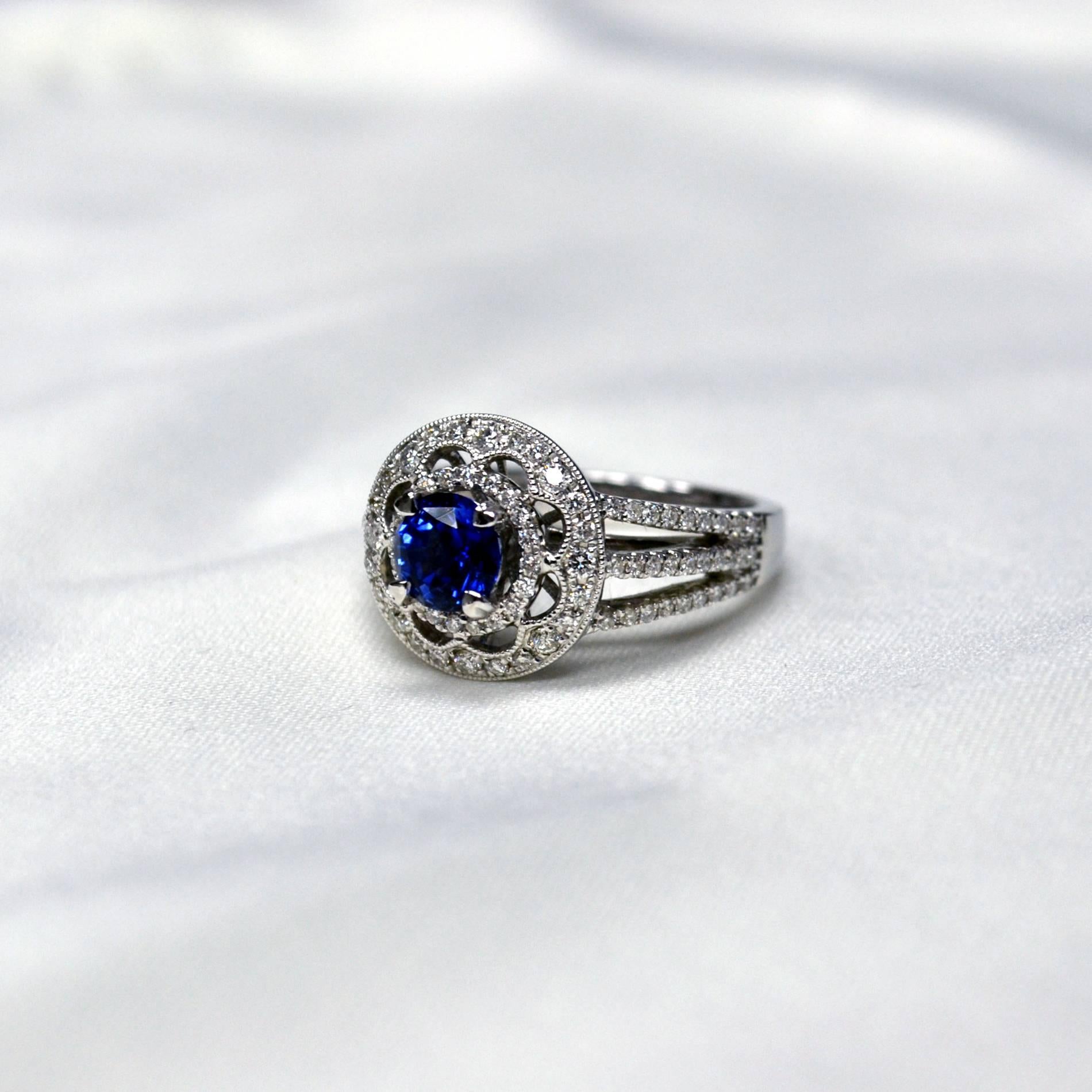 Ring in 18 karat white gold set with one round cut vivid blue Ceylon Blue Sapphire (1.13 carat) and 100 round brilliant-cut Diamonds (0.62 carats)

Ring US Size 6
*Complimentary resizing service*