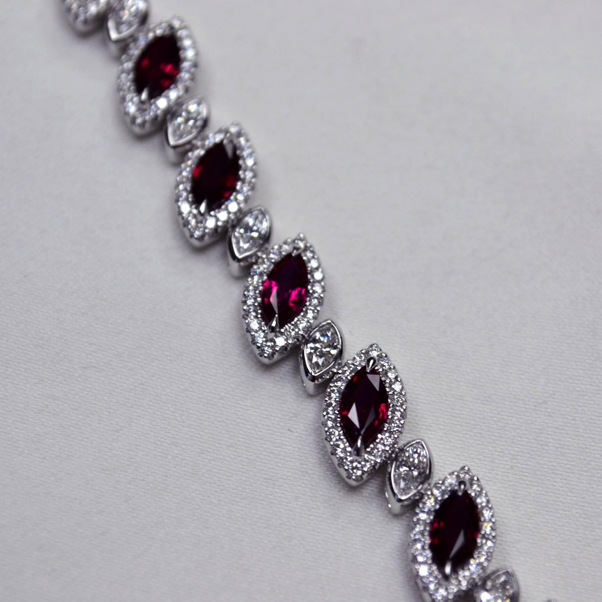 Bracelet in 18 karat white gold set with 15 vivid red marquise cut Mozambique Rubies (6.19 carats), 15 marquise cut Diamonds (1.33 carats), and 300 round brilliant-cut Diamonds (1.52 carats).