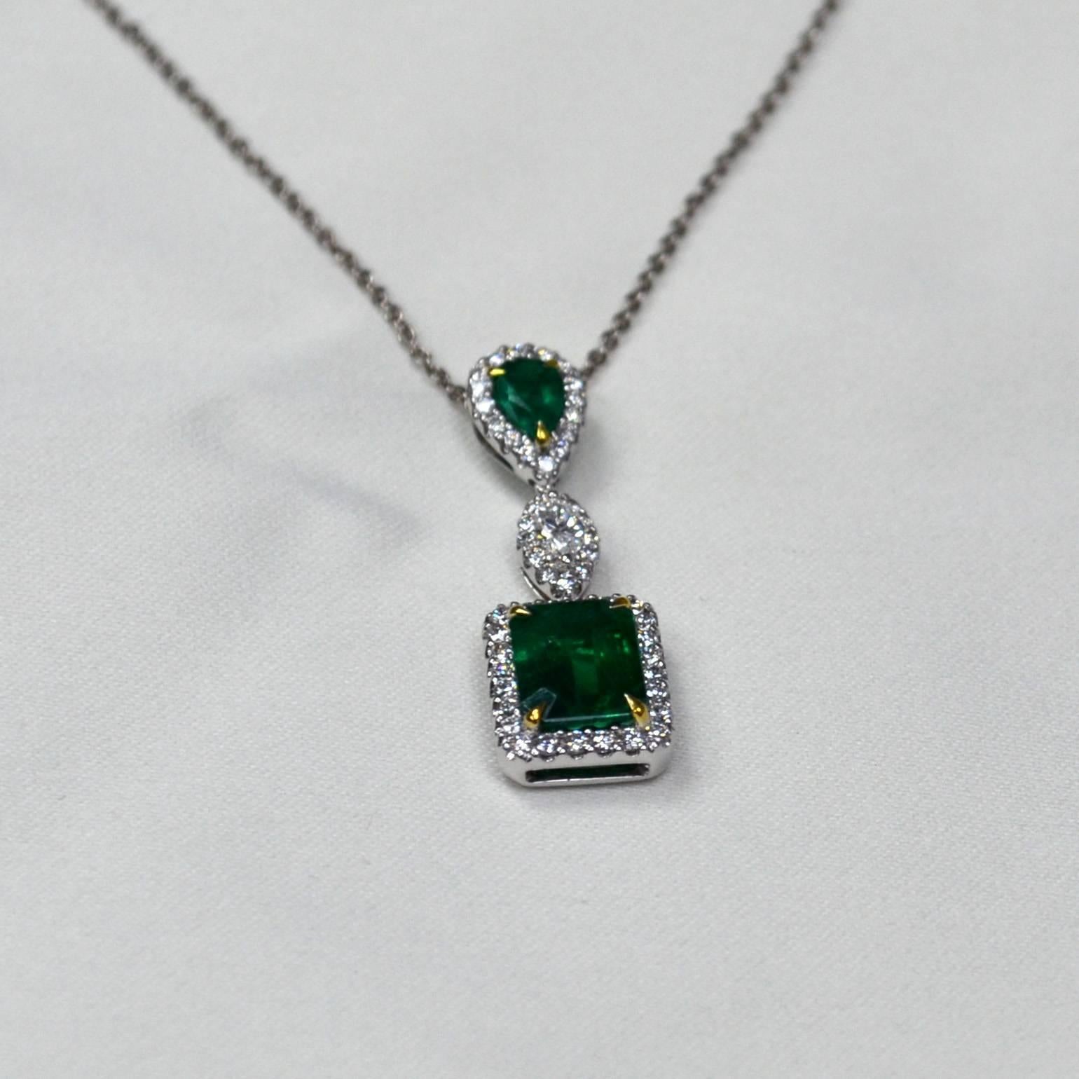 Modern Emerald Cut Emerald Diamond 18 Karat Gold Pendant Necklace For Sale