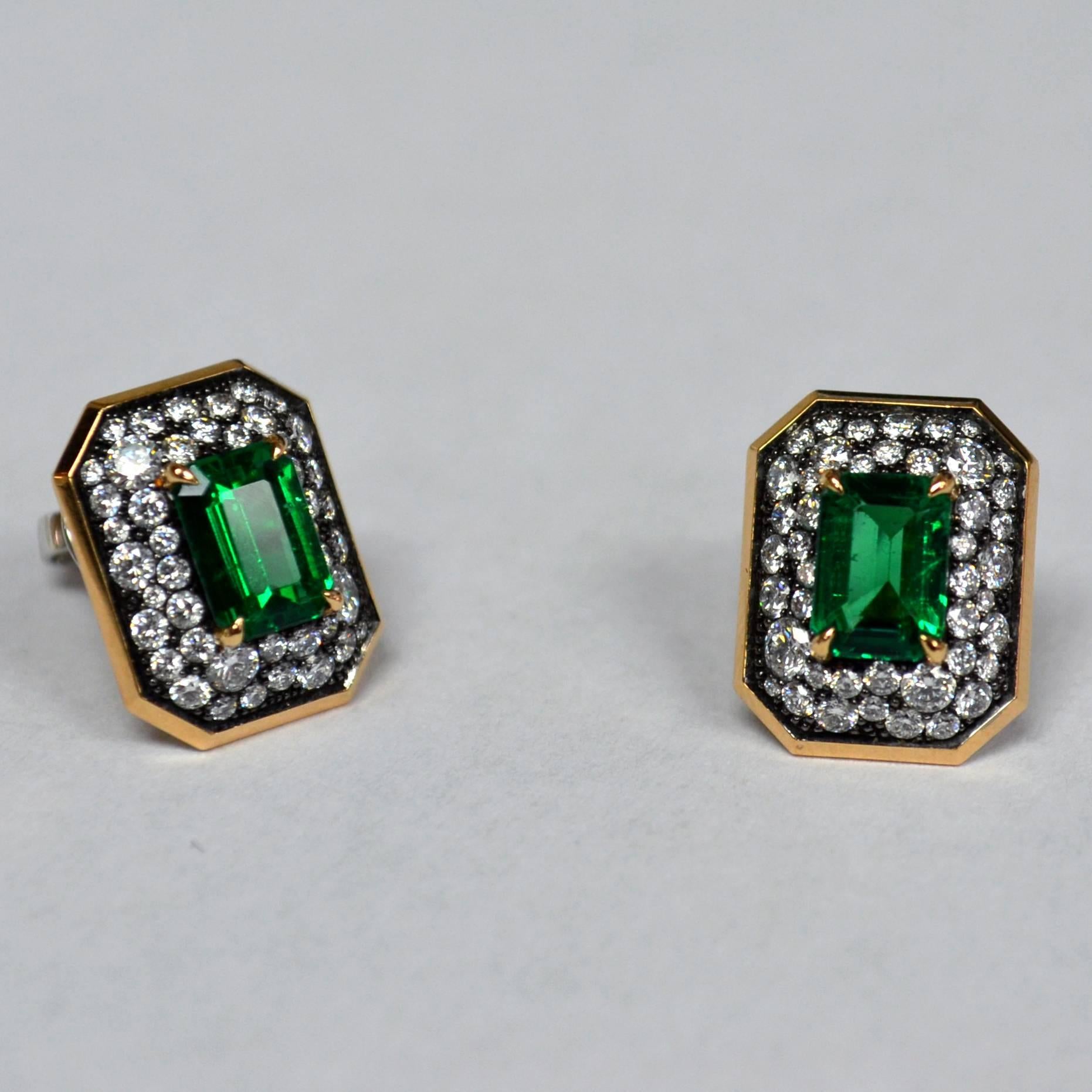 Earrings in 18 karat black rhodium yellow gold set with 2 emerald cut 7x5 mm Emeralds (1.49 carats) and 88 round brilliant-cut diamonds (1.05 carats).

Push Back closure with 18 karat white gold La Pousette earring backings. 