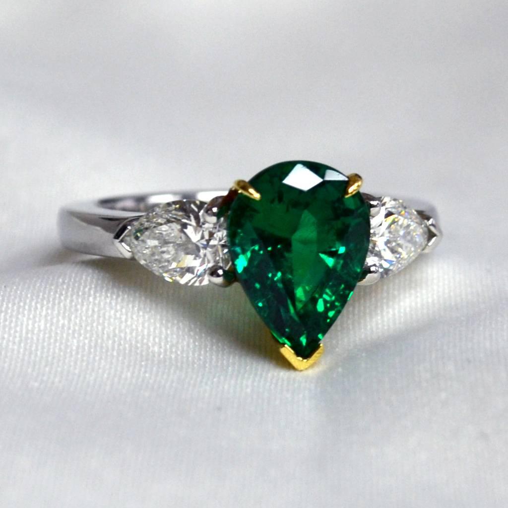 Ring in two tone platinum set with a pear-shaped Colombian Emerald (2.21 carat) and 2 pear-shaped Diamonds ( 1.00 carat). 

Includes Gemstone Report by C.Dunaigre, Switzerland.
Ring US Size 6
*Complimentary resizing service*