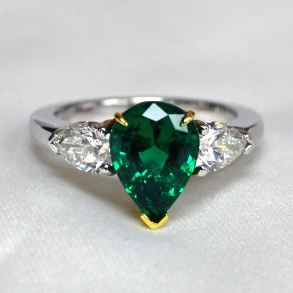 Pear Cut Pear Colombian Emerald Diamond Platinum Three-Stone Ring For Sale