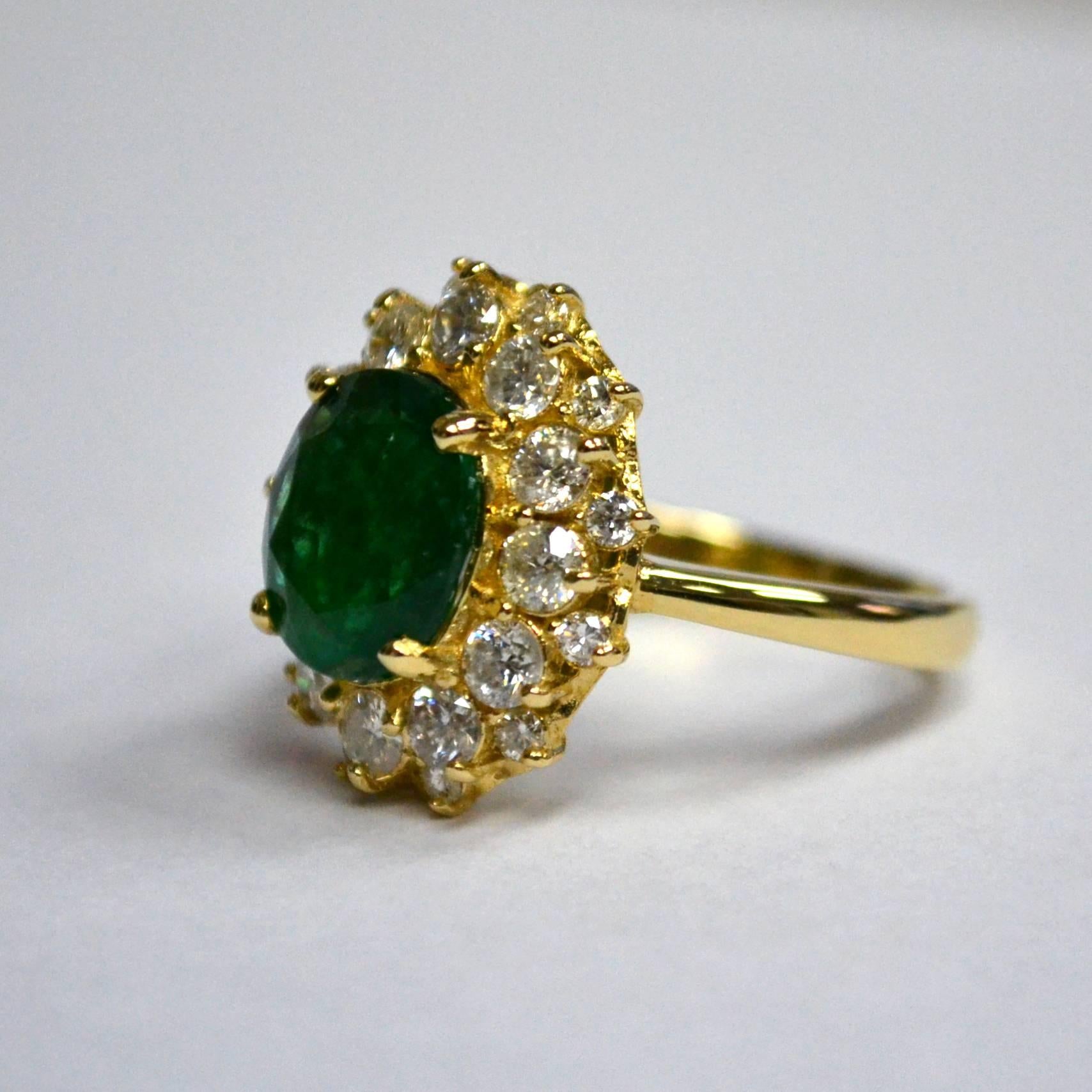 oval emerald diamond ring