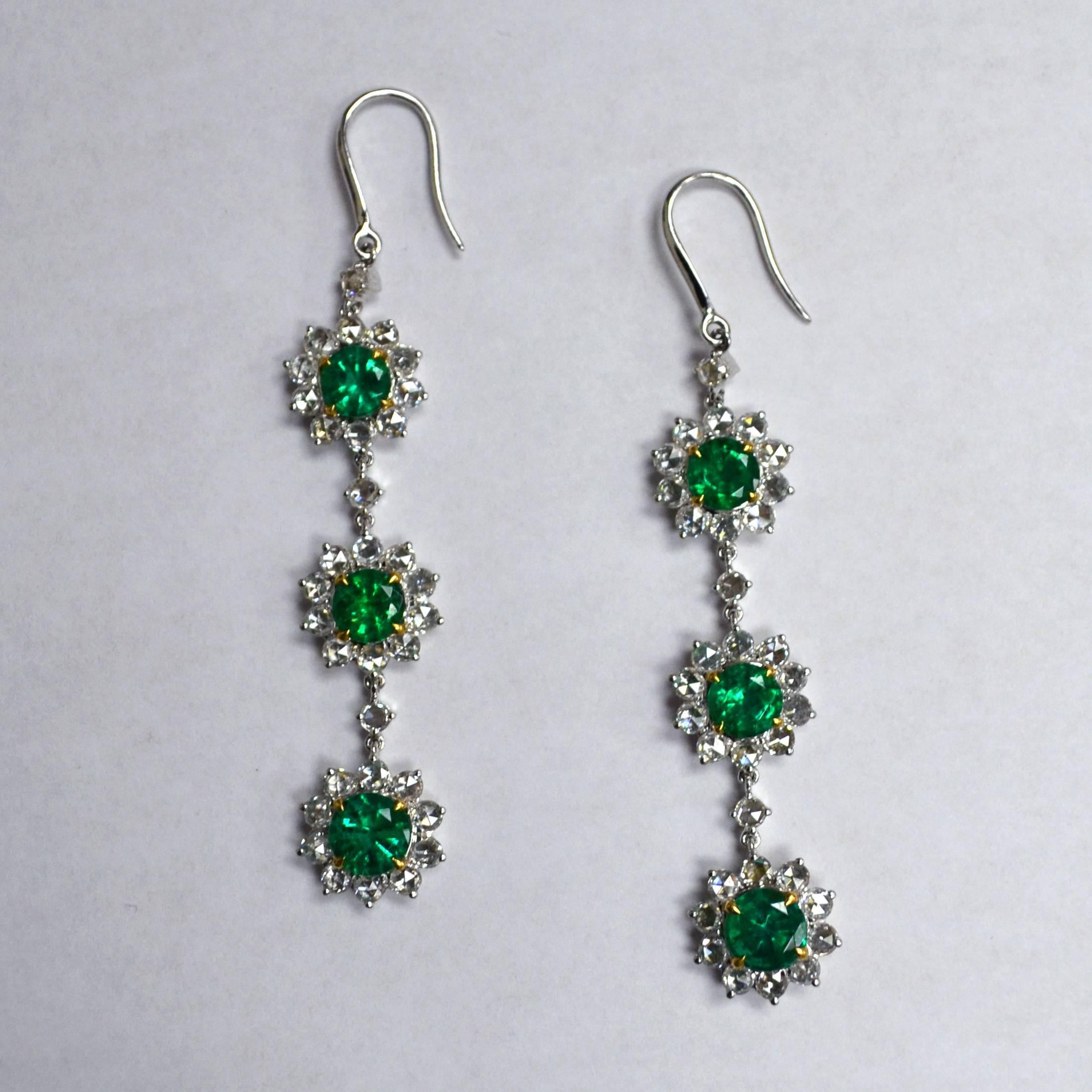 French Hook Earrings in 18K two-tone gold set with 6 round brilliant-cut Zambian Emeralds (4.01 carat) and 66 round brilliant-cut Diamonds (3.08 carat) 
