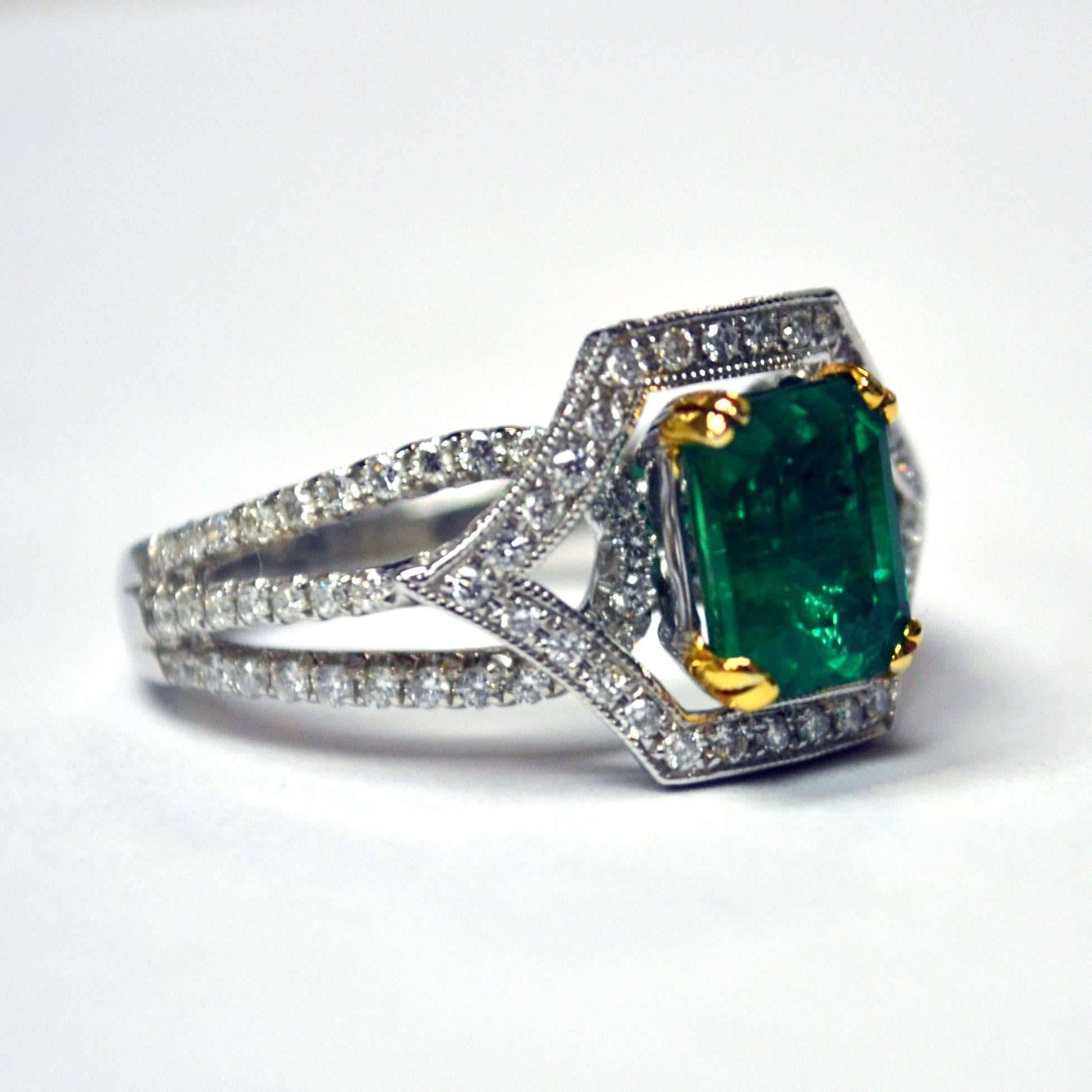Solitaire Ring in 18K white gold set with an emerald cut Zambian Emerald (1.78 carat) and 128 round brilliant-cut Diamonds (0.78 carat) 

Ring US Size 6.5
*Complimentary resizing service* 