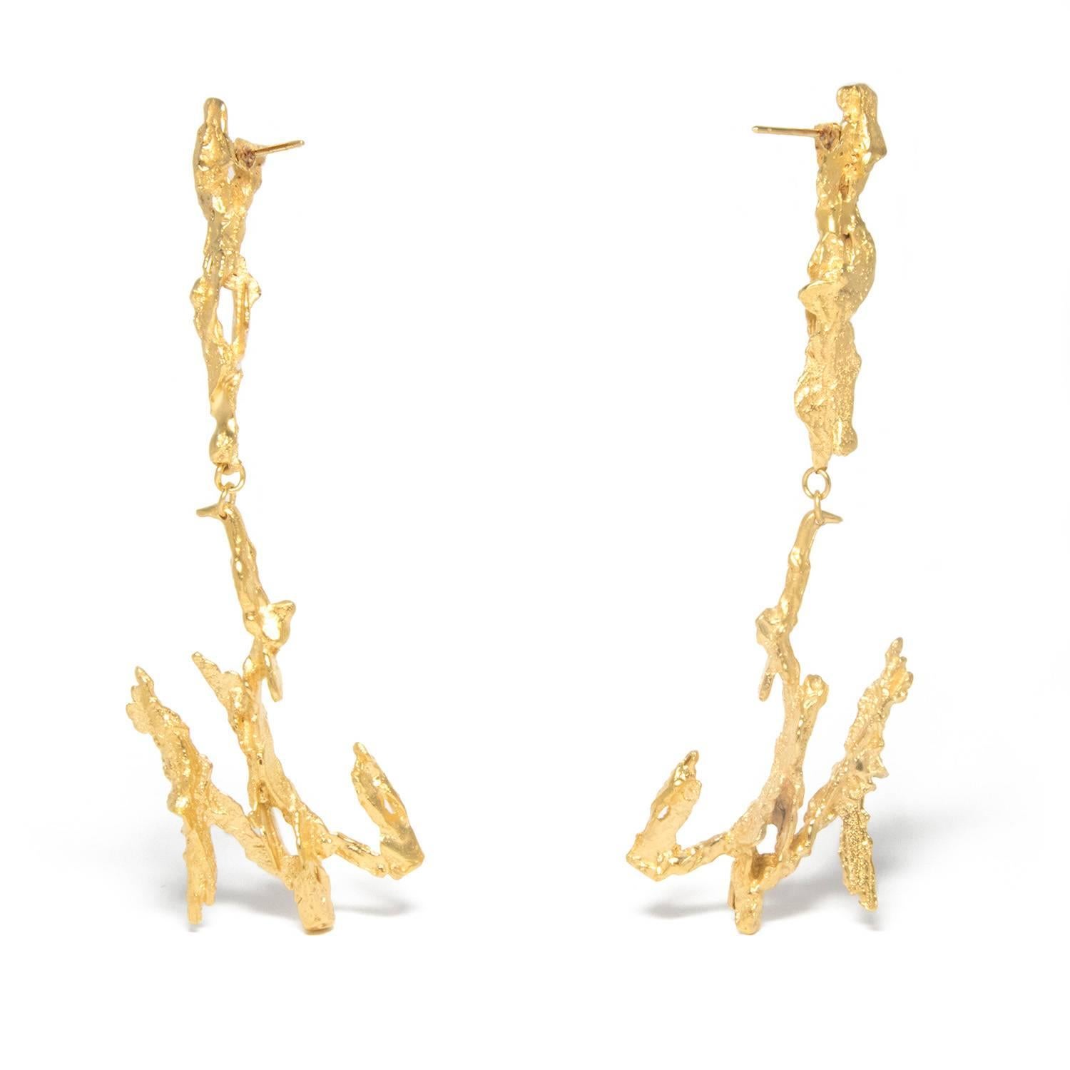 Poseidon: The mythical Greek god of the sea.

Shoulder-grazing style is embraced by these eye-catching Poseidon earrings. Named for the Greek God of the sea, they portray two remarkable, lightning-bolt-like shapes in a high-shine gold vermeil. When