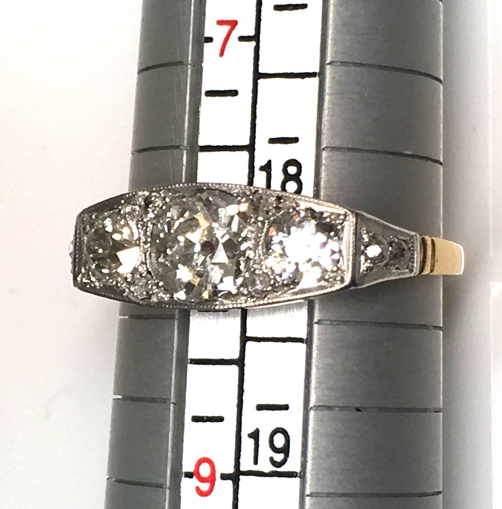 Women's Art Deco 1930s Three-Stone Diamond Platinum and Gold Ring