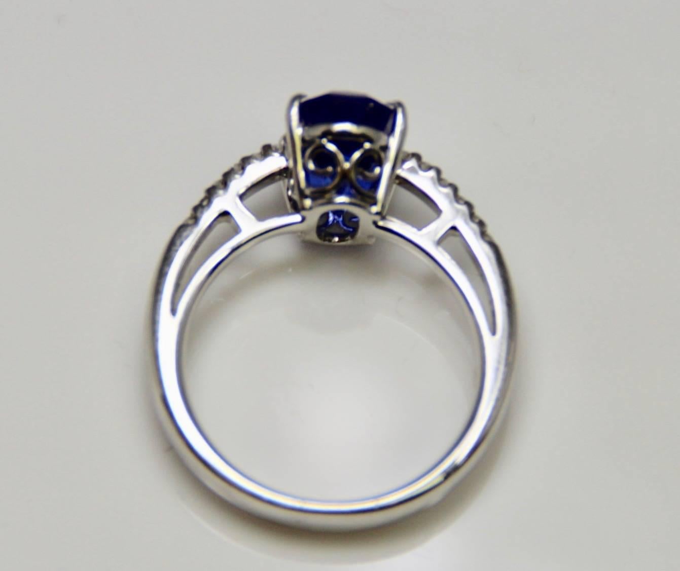 Modern 3.52 Carat Tanzanite and Diamond Ring For Sale