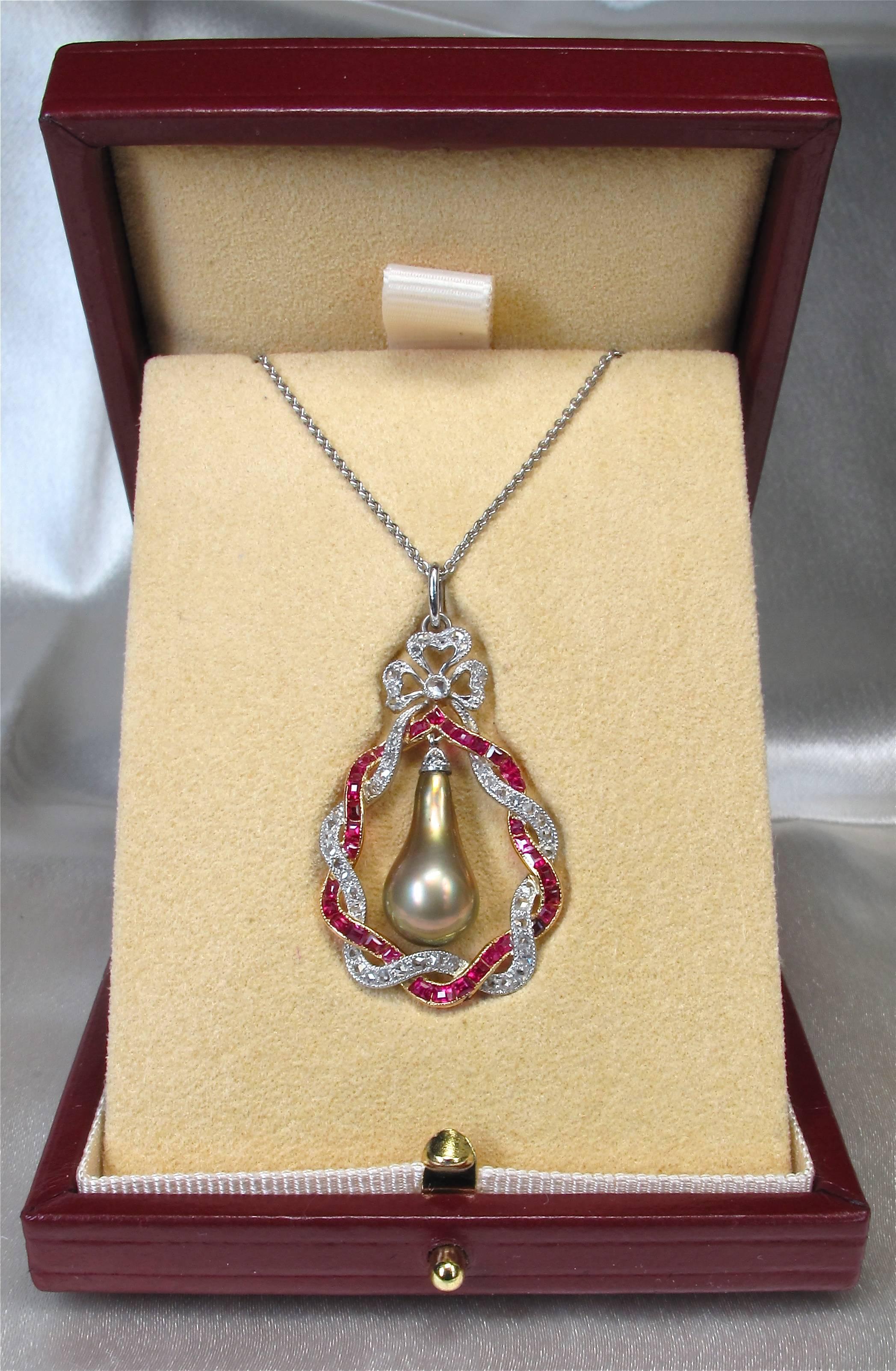 Edwardian Bronze Natural Pearl Drop Rubies Diamonds Pendant In New Condition In London, GB