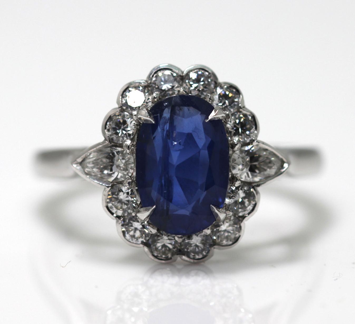 Modern Sapphire 1.85 Carat and Diamond Cluster Ring Mounted in Platinum