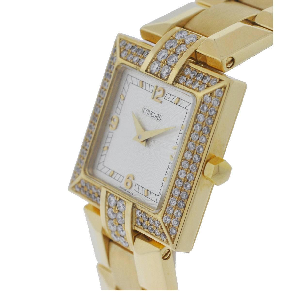 Company - Concord
Model - LA SCALA
Case Metal - 18K Yellow Gold
Case Size - 28mm
Dial - White
Bezel - Diamonds
Bracelet - 18K Yellow Gold
Crystal - Scratch Resistant Sapphire Crystal
Movement - Quartz
Features - Hours and Minutes