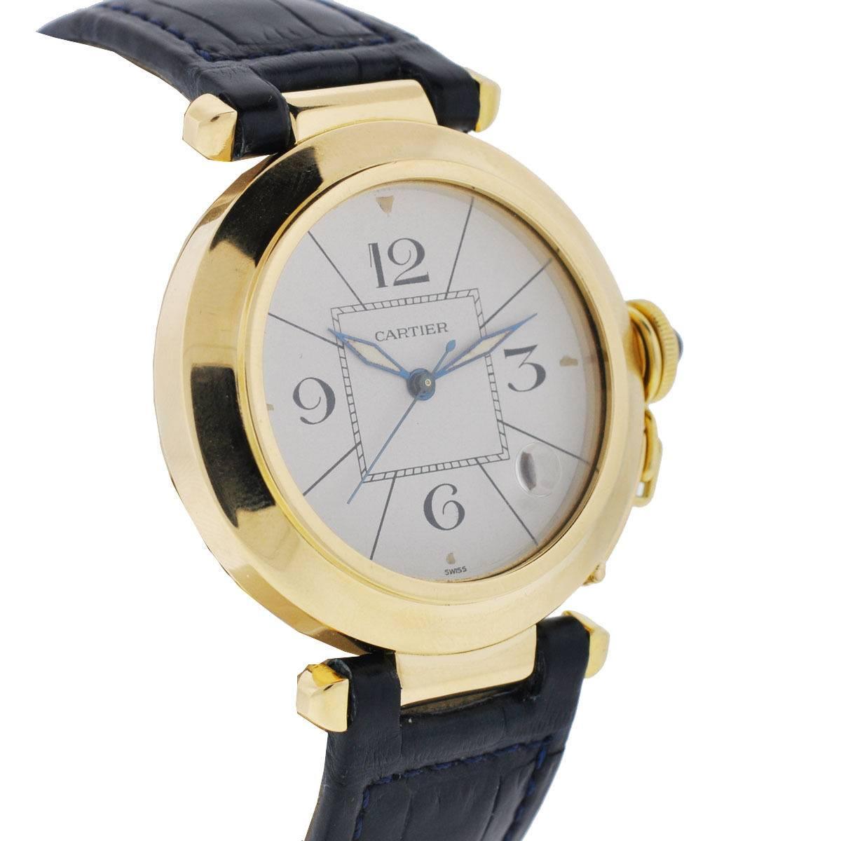 Company - Pasha
Model - Pasha
Case Metal - 18k Yellow Gold
Case Size - 38mm
Dial - White
Bezel - 18k Yellow Gold
Bracelet - Blue Leather, Shows cracks and wear on the band 
Crystal - Scratch Resistant Sapphire
Movement - Automatic
Features - Hours,