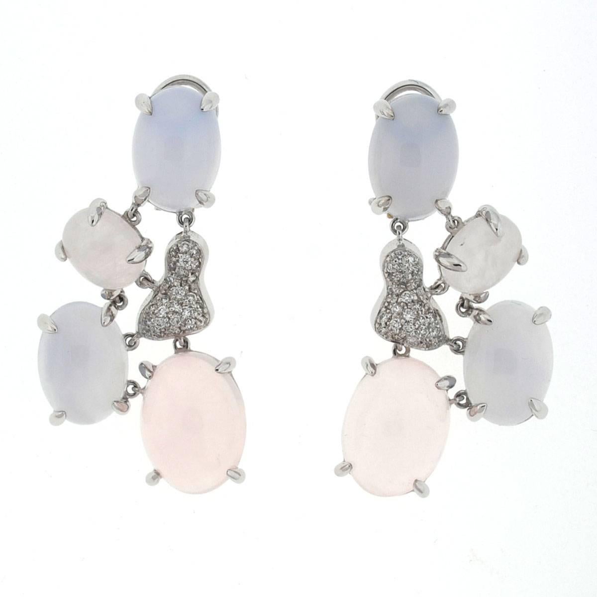 Style - Drop Earrings
Metal - 18k White Gold
Stones - Moonstones and Diamonds
Weight - 22.5 G
Length - 1.5