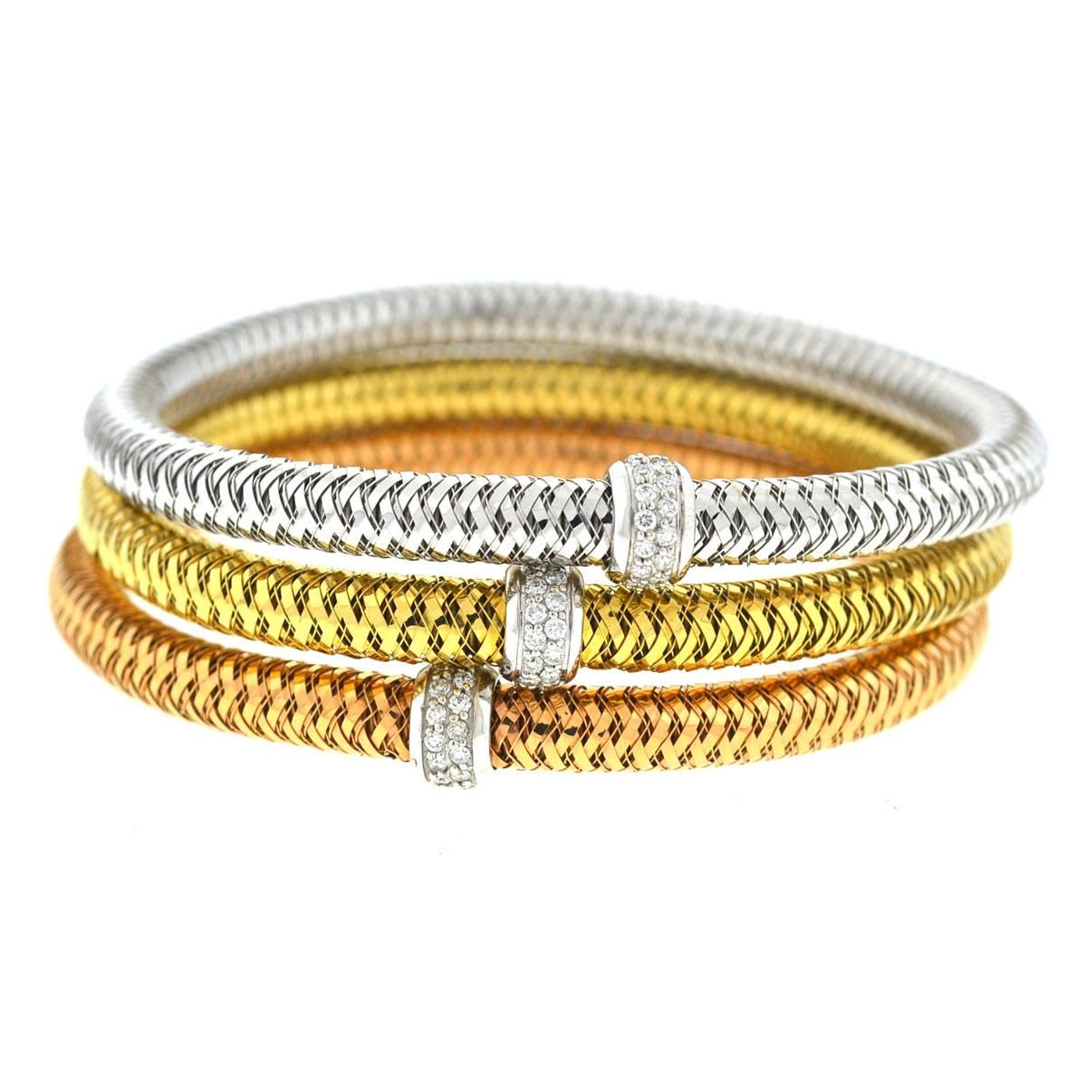 Company - Roberto Coin
Style - Primavera Flexible Bangle Bracelets w/ Diamonds
Metal - 18k Gold
Stones - Diamonds - Approx. .22 ctw each bracelet
Weight - 13.3 grams each
Length - 7"
Includes - Bracelet Only
5628-1ree/5628-2ree/5628-3ree