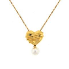 Tiffany & Co. 18 karat Gold Arrow Heart Necklace