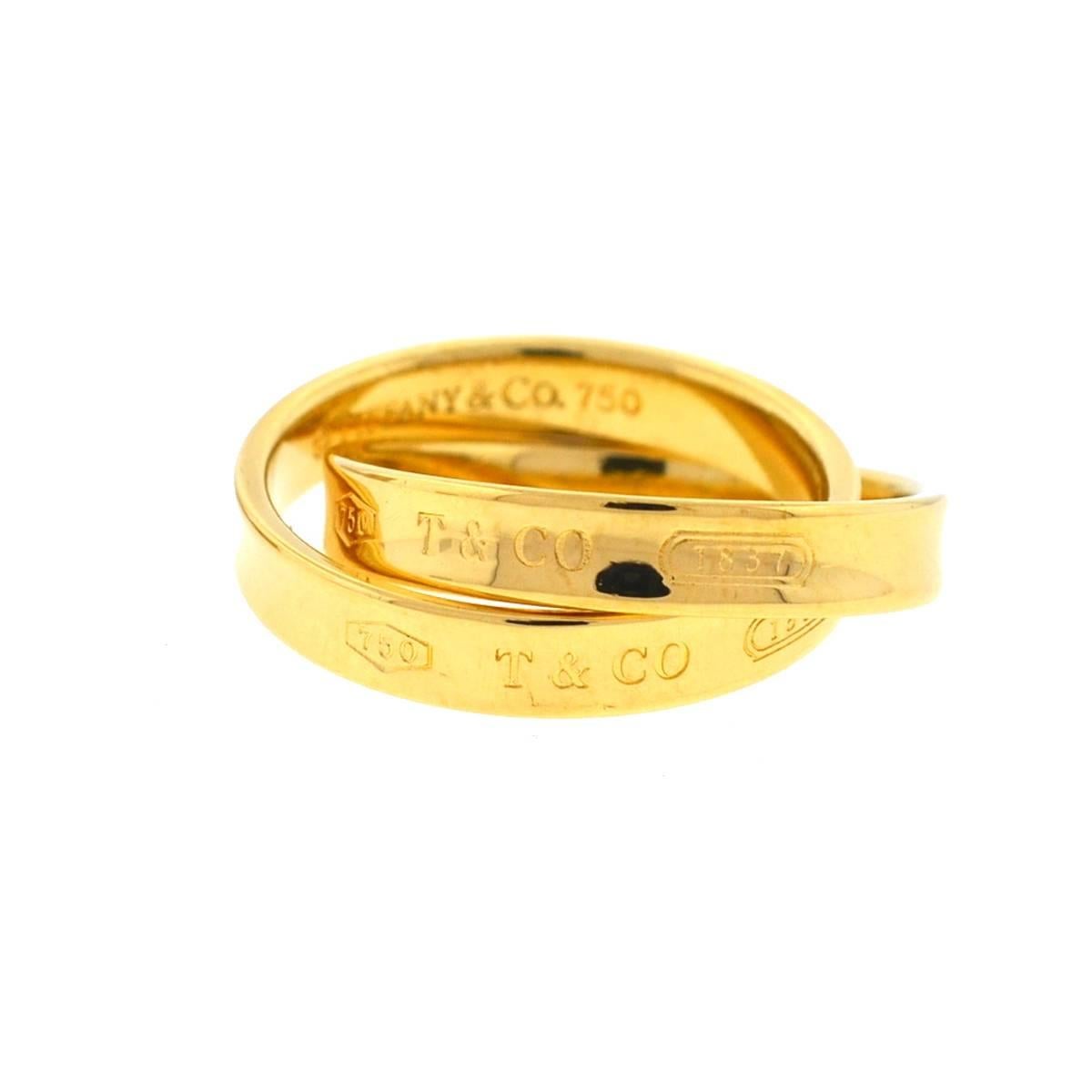 Company - Tiffany & Co.
Style - Interlocking Circles Ring
Metal - 18k Yellow Gold 
Size - 5.5
Weight - 7.8 grams
Includes - Ring Only
8693-10uee