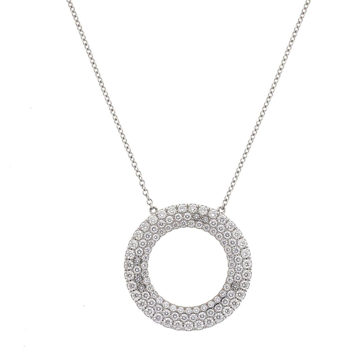 Company - Tiffany & Co
Style - Metro 3 Row Circle Pendant
Metal - 18k White Gold
Stones - Diamonds - .70 cts 
Chain Length - Size 16