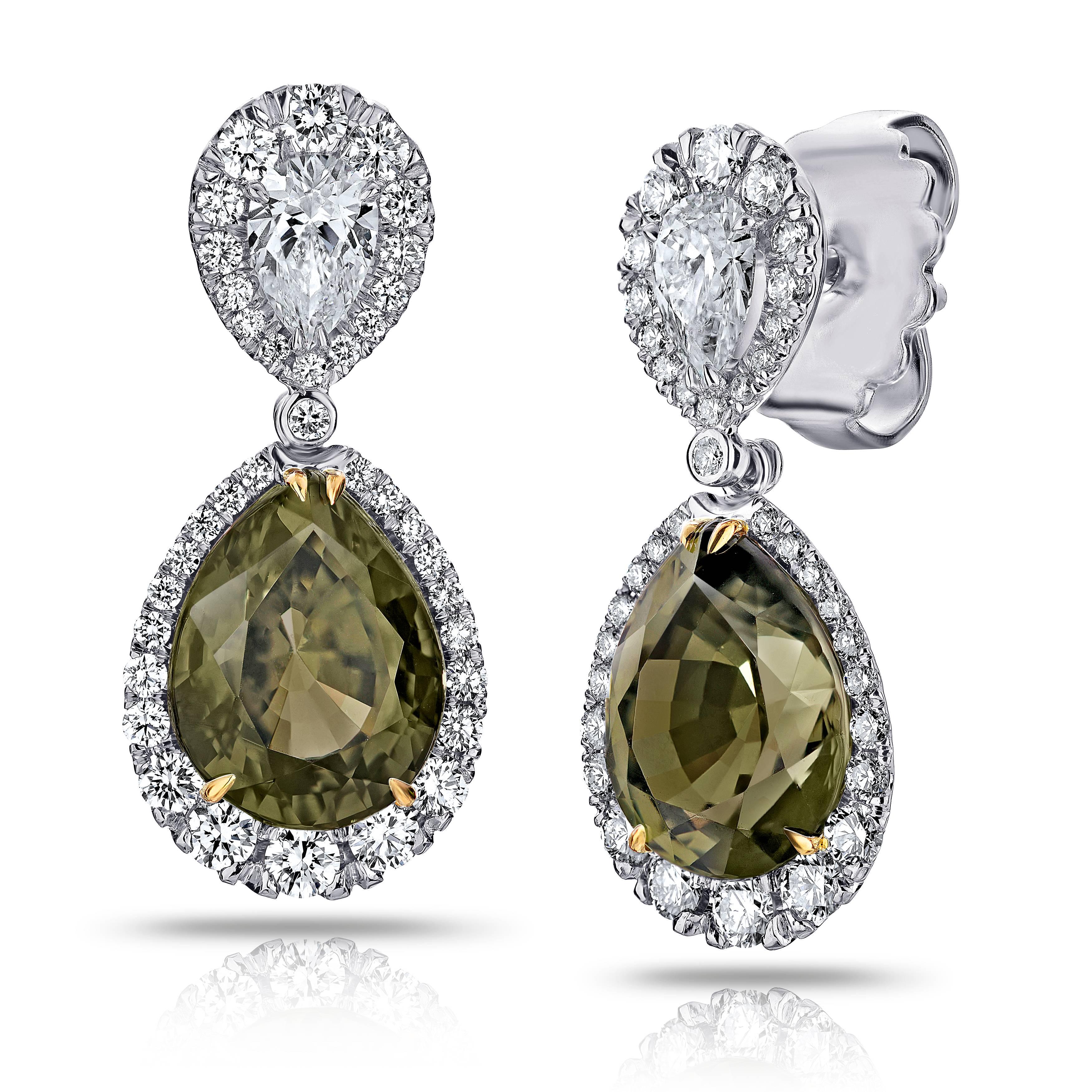 Pear Shape Green Sapphire and Diamond Platinum Drop Earrings, two green sapphires weighing 7.53 carats and two pear shape and seventy two round diamonds weighing 1.42 carats. Set in hand made platinum earrings. Only the finest quality stones and