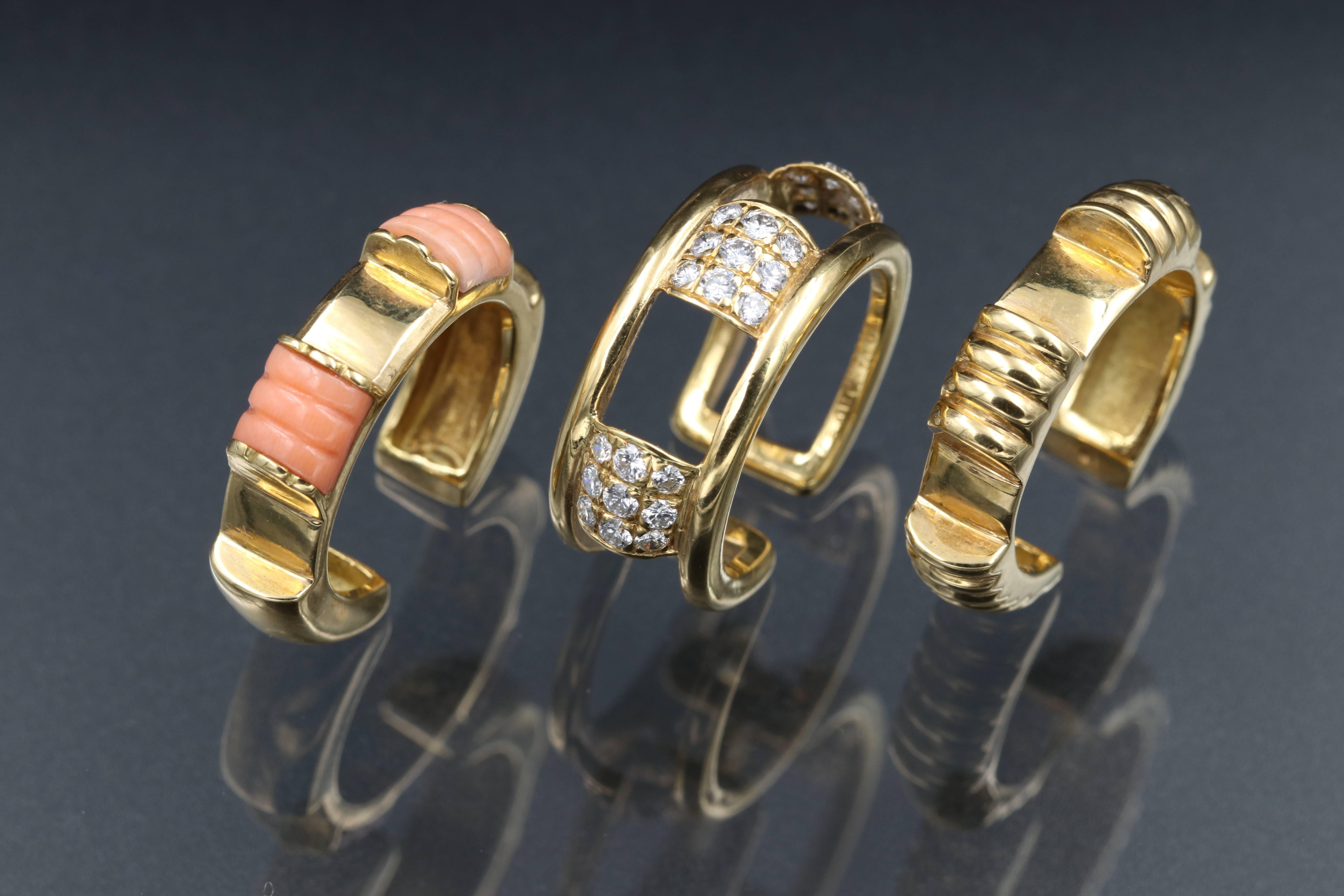 3 exchangeable rings of 18K gold diamonds and coral by Maison Boucheron. Signed
The total weight is 20.3 grams
The size is 51 (5.5 US) not sizeable 

