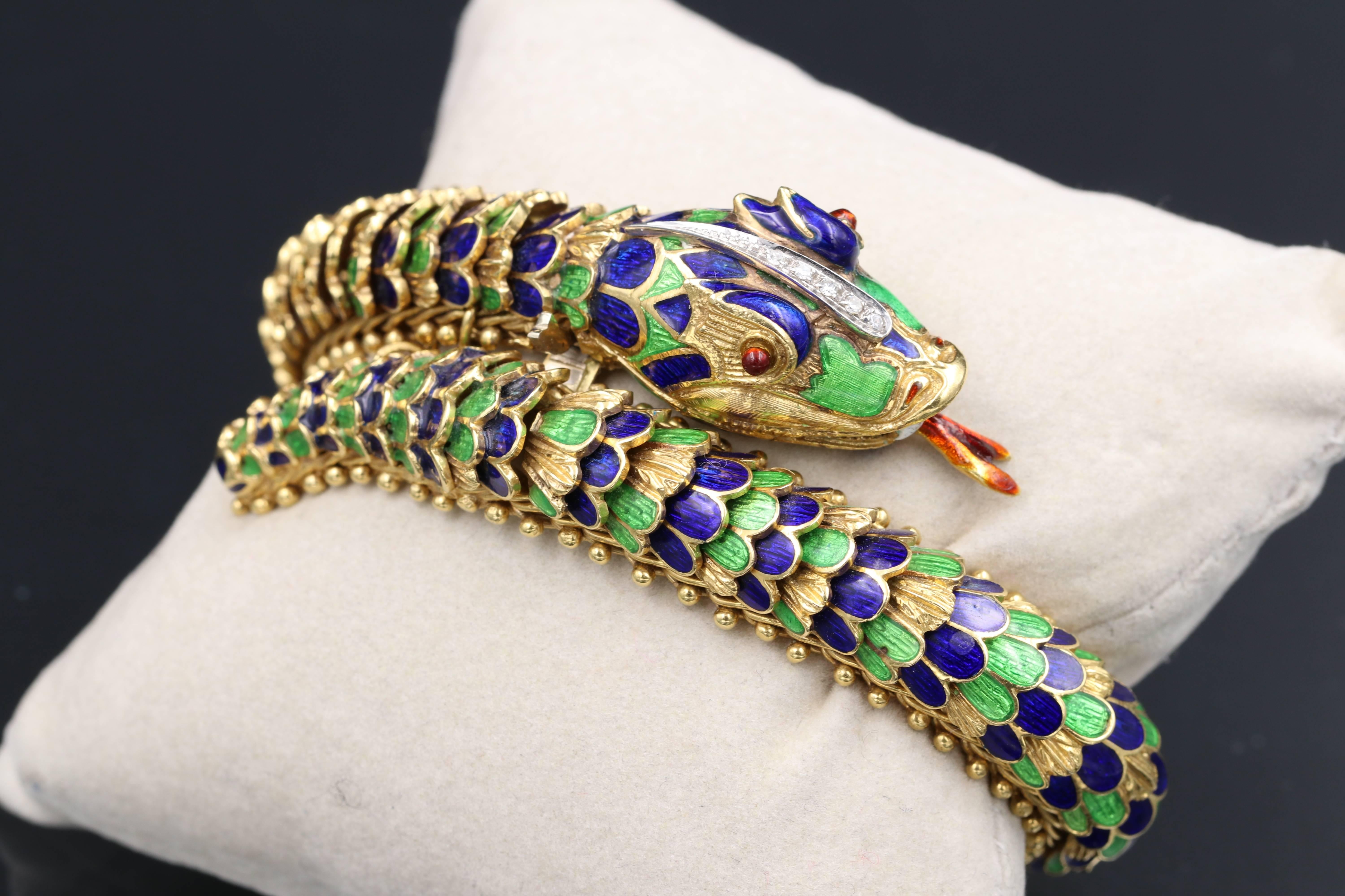 Beautiful and very well articulated gold 18K, diamonds and enamel bracelet, french made circa 1950. Very beautiful work in perfect condition. 
It weights 95.80 grams.
The diameter is 6x5.5 cm.
