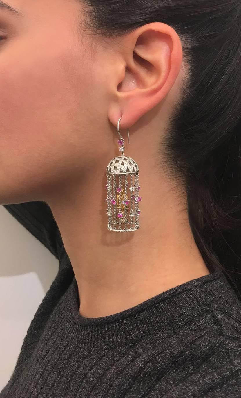 Handmade in Italy.
4.28ct Round Diamonds - 3.12ct strong Pink Round Sapphires - 18k White and Yellow Gold.

The marvel of a child with his nose pressed against the toy store window is a commonly shared memory. The Fantasy World jewels are updated