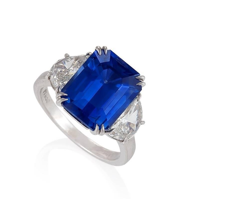 In this elegant, minimalist ring, a seven-carat Ceylon no-heat bright blue sapphire is paired with beautifully-cut half moon diamonds, faceted to showcase their brilliance and spectral colors. The sapphire’s hypnotic deep blue hue is enhanced by the