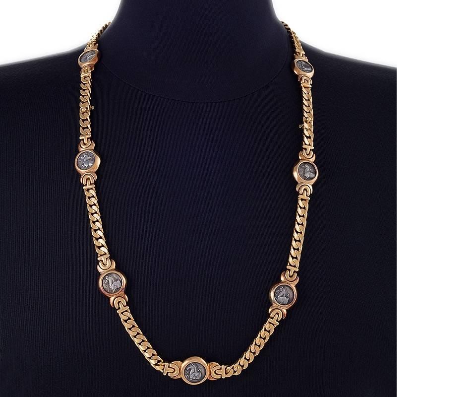 An Italian 18 karat gold and ancient coin necklace and combination pair of bracelets by Bulgari. The necklace and bracelets combine to form a 23-1/2