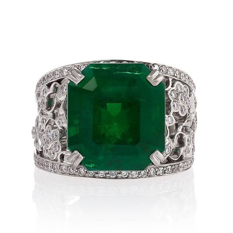 A French Estate 18 karat white gold ring with emerald and diamonds by Chanel. The ring centers on an octagonal step cut emerald that weighs 10.37 carats.  The ring is set with 224 round-cut diamonds with an approximate total weight of 9.00 carats,