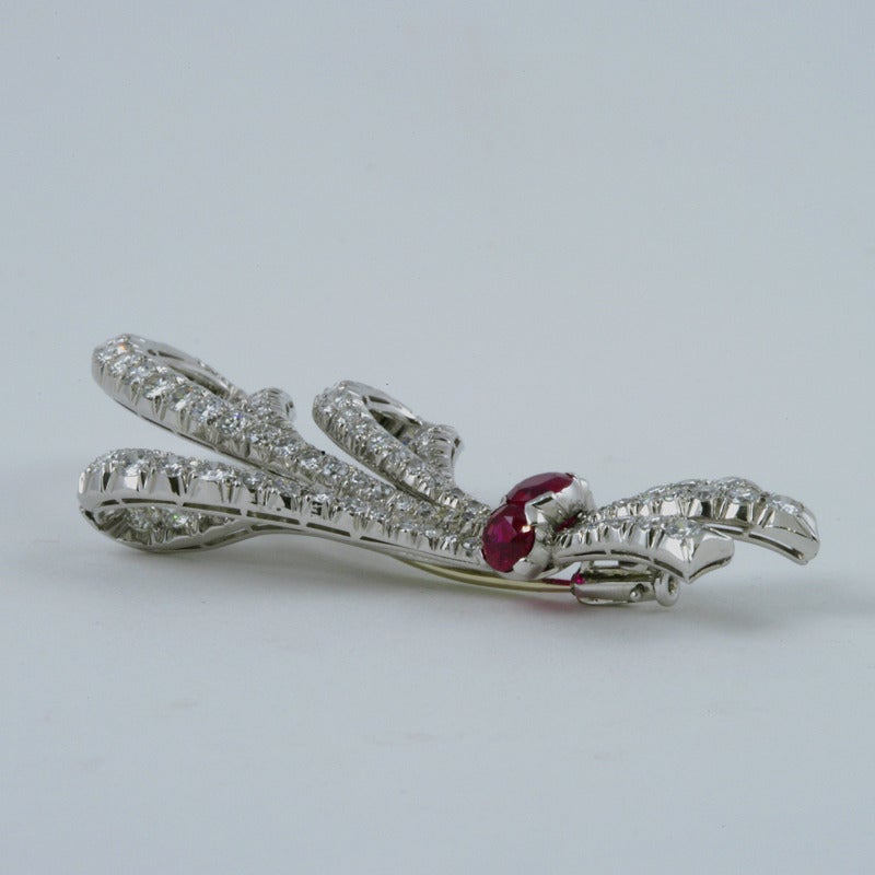 1960's Ruby Diamond Platinum Triple Bow Brooch In Excellent Condition In New York, NY