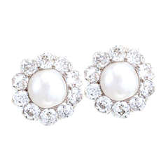 Edwardian Platinum-topped Gold Pearl Earrings Surrounded by Diamonds