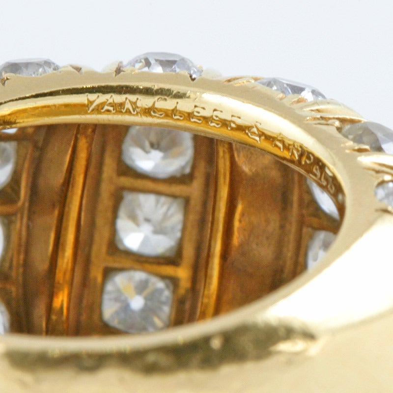 A French 18 karat gold ring with diamonds. The ring has 33 old European-cut diamonds with an approximate total weight of 1.65 carats The ring is in the form of a five-sectioned diamond set domed ring; the "Watermelon" ring. This ring can