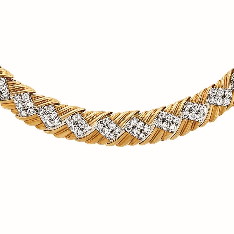 An American Estate 18 karat gold necklace with diamonds. The necklace is composed of basket weave links centered with 6 diagonally set diamonds.  The necklace contains 192 round-cut diamonds with an approximate total weight of 13.45 carats, G/H