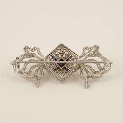Cartier Belle Epoque Diamond Sapphire Gold Platinum Ribbon Brooch