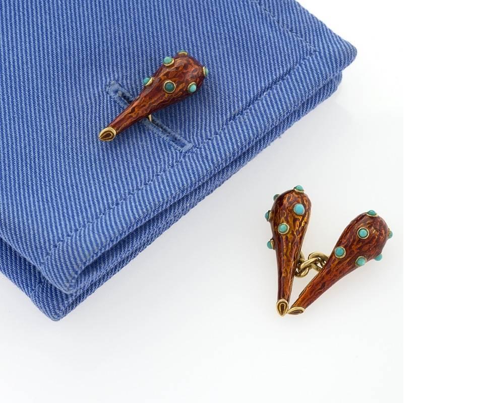 A pair of American 18 karat gold and enamel cuff links with turquoise by Jean Schlumberger for Tiffany & Co. The cuff links have 24 cabochon turquoise stones.  This pair of cuff links are unique: According to Pierce MacGuire, who managed