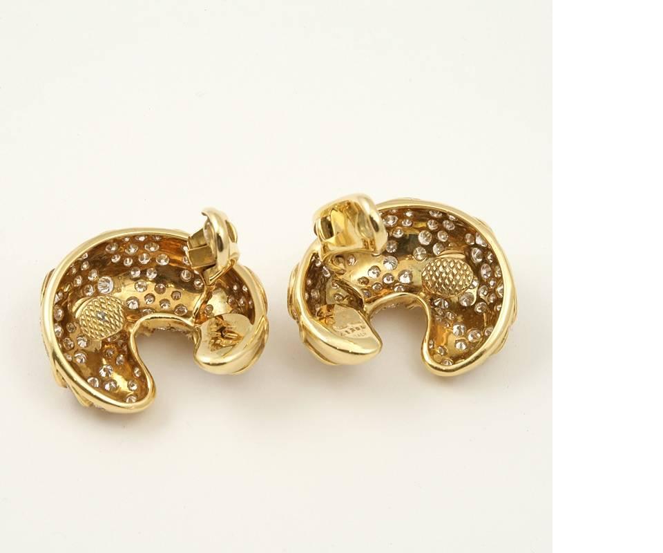A pair of Italian Estate 18 karat gold earrings with diamonds by Marina B. The “Onda” earrings have 240 round-cut diamonds with a total weight of 11.86 carats,F/G color, VS clarity. Estate.

One of Marina B’s first collections in 1978 included the