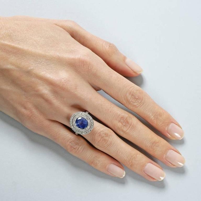 Blue Sapphire Diamond and Platinum Cluster Ring For Sale at 1stdibs