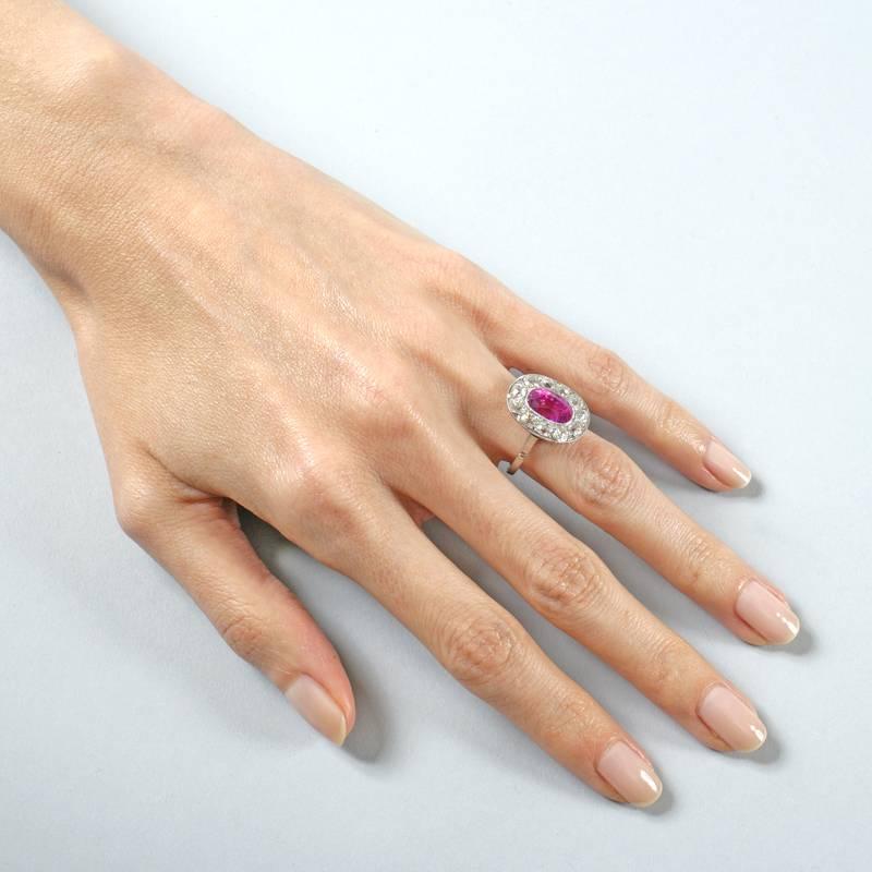 Oval Cut Ceylon Pink Sapphire and Diamond Halo Ring 