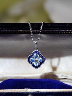 Lily Cut Blue Topaz and Sapphire Halo Pendant Necklace in 14K White Gold