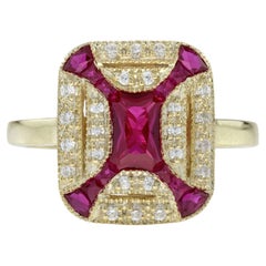 Geometrischer Halo-Ring mit Rubin und Diamanten aus 18-karätigem Gelbgold