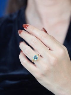 Blue Topaz Peridot Solitaire Ring in 9K Yellow Gold