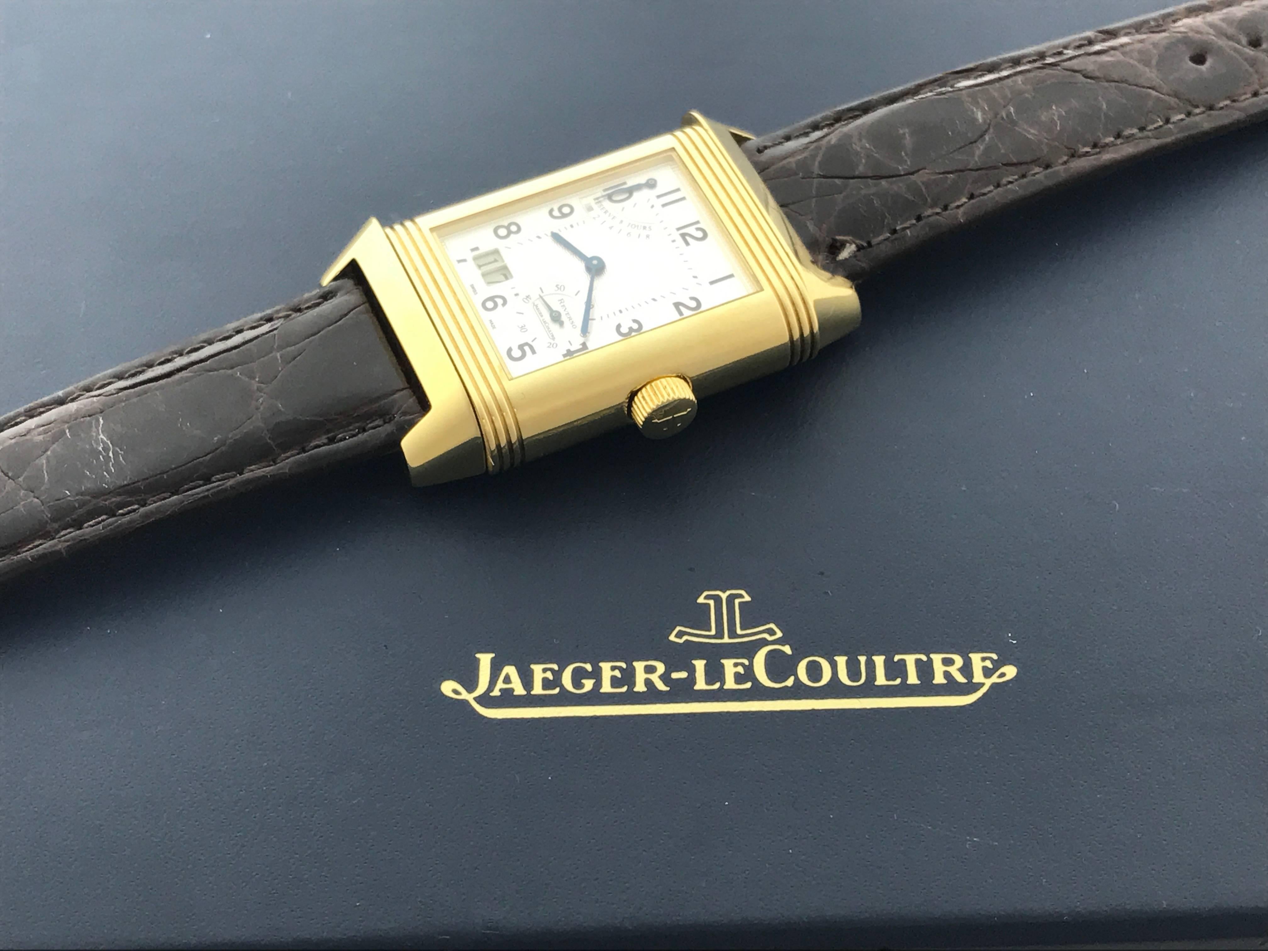 Jaeger-LeCoultre Reverso Model Q300.14.20 certified pre-owned men's wrist watch.  Features include: Manual-winding eight day Caliber 875 movement with duo spring-barrels, power reserve Indicator and big date. Beautiful silver guilloche dial with
