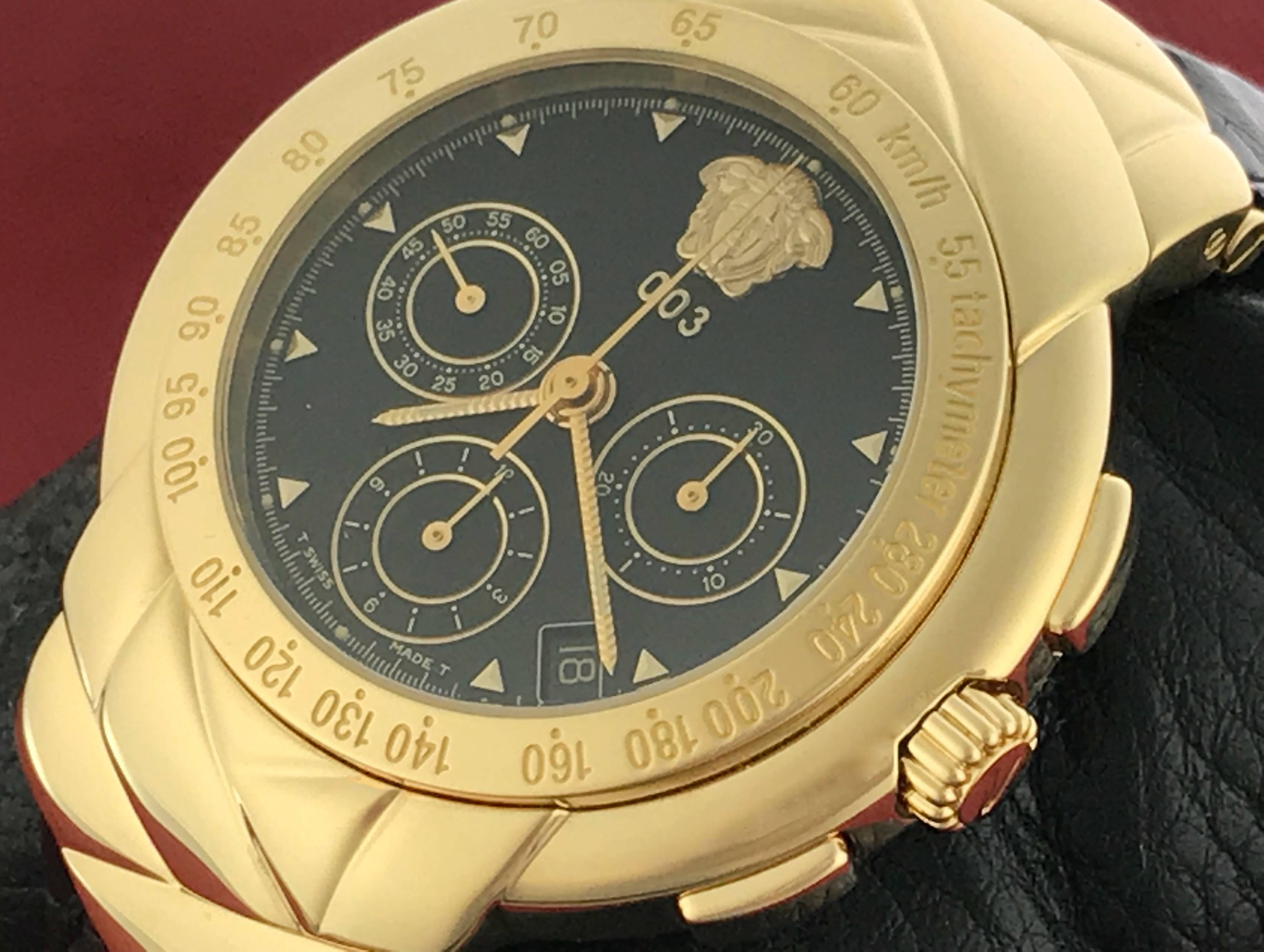 Versace 003 Chronograph 18k yellow gold Model 8 137 922 men's pre-owned automatic wrist watch.  Limited Edition of only 250 Individually Numbered Pieces (No. 001-250). Featuring  a stunning Black Dial with yellow gold polished hour markers and Heavy