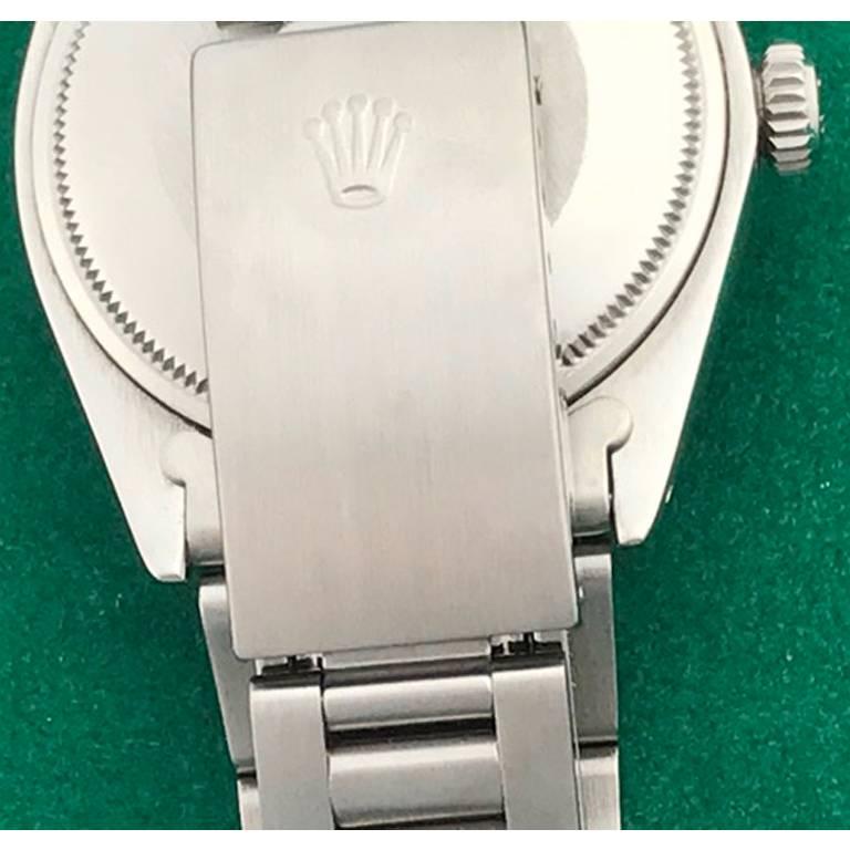 Rolex Men's Date Ref 1500, certified pre-owned and ready to ship.  Automatic Winding Oyster Perpetual Movement.  Stainless Steel case with smooth bezel, measures 34mm in diameter.  Features Stainless Steel Oyster bracelet and Oyster Silver Dial with