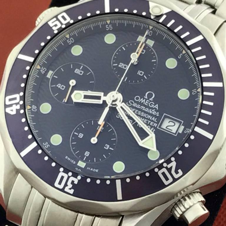 As New Omega Mens Seamaster Professional Chronograph, Model Number: Model 2599.80.00. Automatic Winding Movement, Chronograph with Helium Release Valve. Stainless Steel round style case with blue rotating bezel (42mm dia.). Stainless Steel Omega