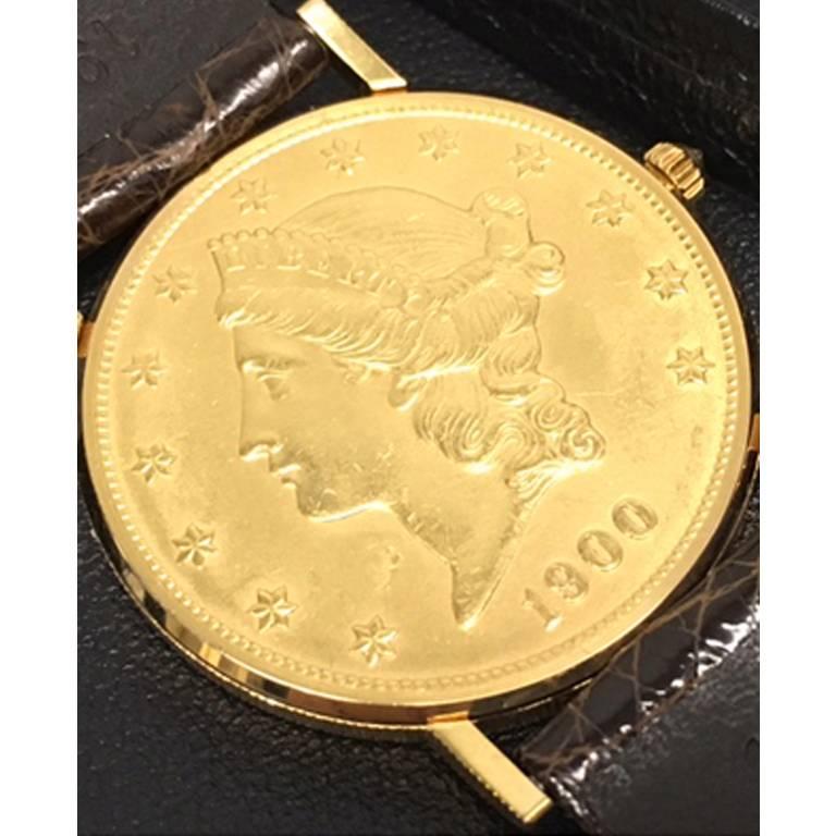 As New Corum Gold Piece Mens Quartz Wristwatch. U. S. Twenty Dollar 1900 Liberty Coin with Diamond cabachon setting crown (35mm dia.). Dark brown alligator strap. Certified Pre Owned, looks brand new and ready to ship.  Corum box included.