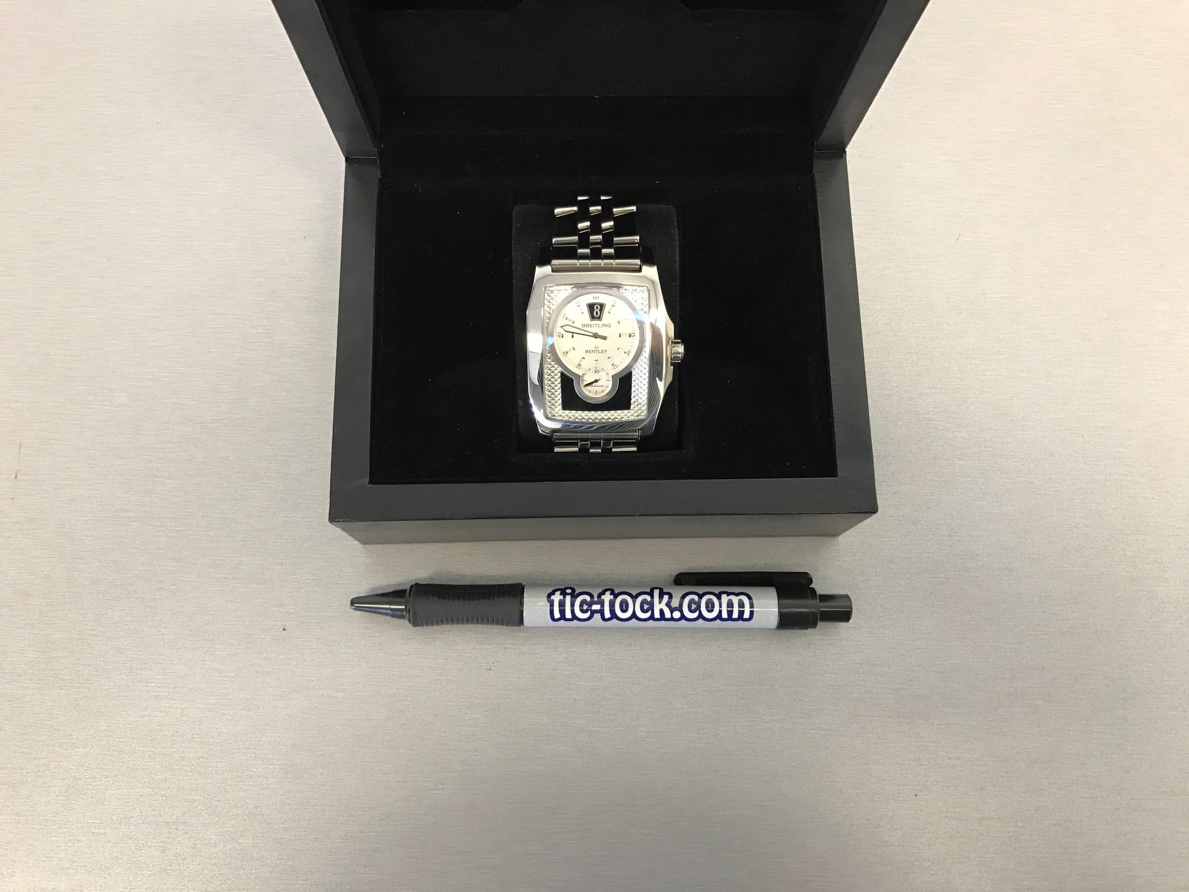 Mens Breitling Bentley Flying B Model A2836212/C722/DMCF
Automatic Winding Movement.  Large oversize Stainless Steel rectangular style case (39x67mm). Stainless Steel Breitling bracelet with deployant clasp. Silver and Black Jump Hour style Dial