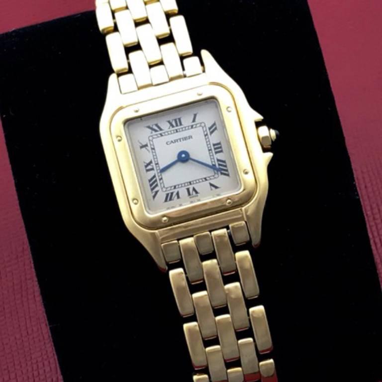 Cartier Ladies Panther Model W25022B9 18K Yellow Gold wrist watch. As new, Certified pre-owned and ready to ship.  Quartz movement, 18K Yellow Gold square case.  18K Yellow Gold Cartier bracelet with deployant clasp. White dial with black Roman