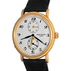 Patek Philippe Yellow Gold Travel Time Manual Wind Wristwatch