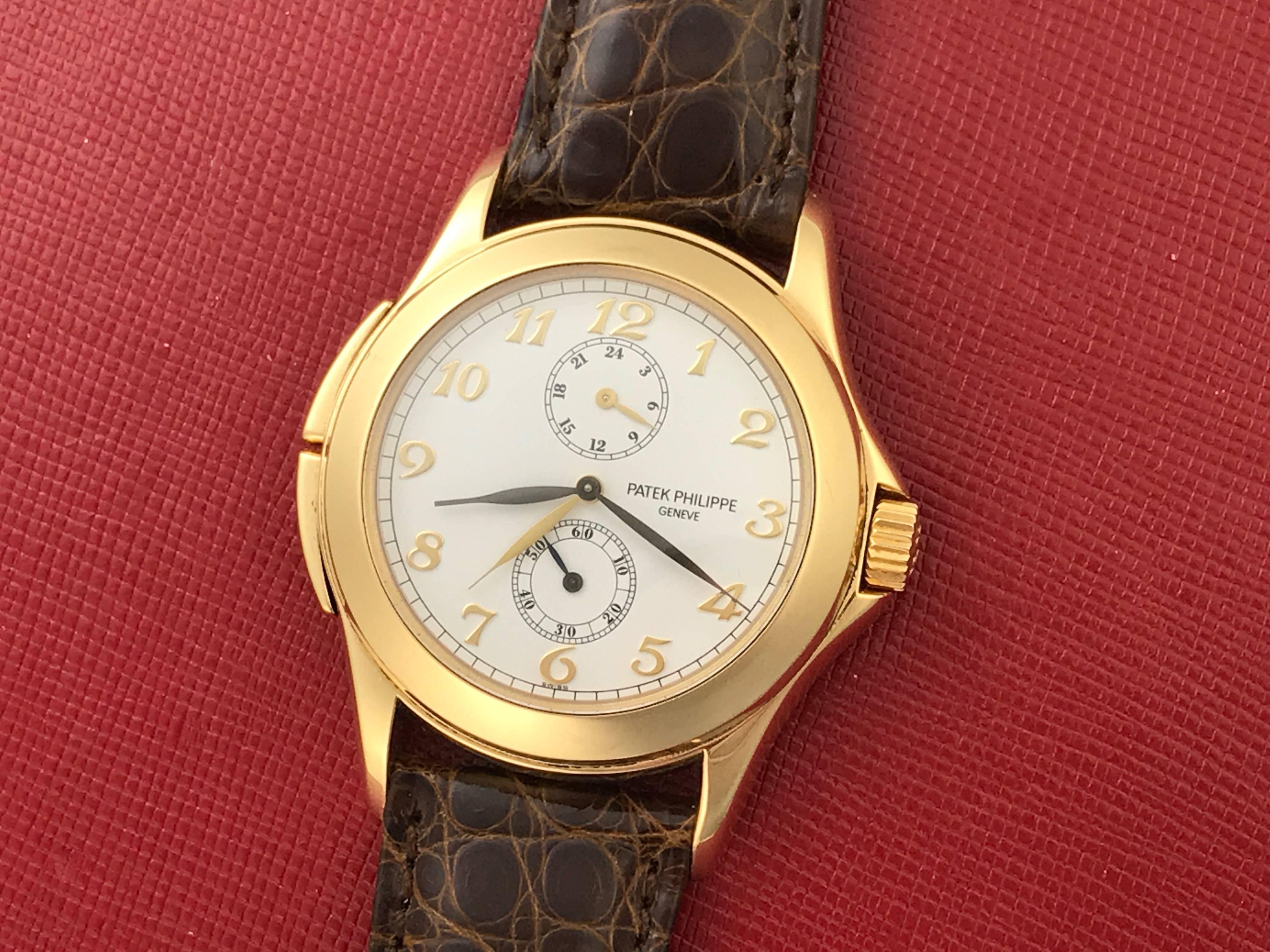 Contemporary Patek Philippe Yellow Gold Travel Time Manual Wind Wristwatch Ref 5134J-001 